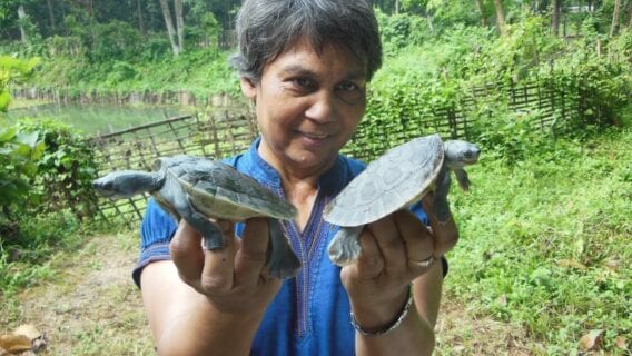 Rupali Ghosh holding two turtles